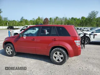 2012 Suzuki Grand Vitara Premium z VIN JS3TD0D60C4100503, wystawiony jako Copart lot #59050575 z przebiegiem 158 052 mil mil oraz Tytuł czysty. Historia ofert i sprzedaży dostępna na DreamBid. Obrazek 2.