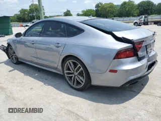 2016 Audi A7 3.0 Prestige with VIN WAU2GAFC4GN029233, listed as a Copart auction lot 61023963 with 163,562 mi miles. Bid and sale history available at carsss.com. Image 2.