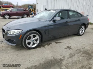 2015 BMW 4 Series 428i xDrive with VIN WBA4C9C58FD331072, listed as a Copart auction lot 53277515 with 203,251 mi miles and Clean Title. Bid and sale history available at carsss.com. Image 1.