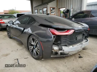 2015 BMW i8 z VIN WBY2Z2C54FV392511, wystawiony jako Copart lot #53033563 z przebiegiem 51 024 mil mil oraz . Historia ofert i sprzedaży dostępna na DreamBid. Obrazek 2.