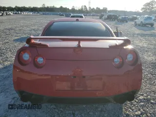 2010 Nissan GT-R Premium z VIN JN1AR5EF0AM230171, wystawiony jako Copart lot #66912074 z przebiegiem Nie podano mil oraz Szkody całkowita. Historia ofert i sprzedaży dostępna na DreamBid. Obrazek 6.