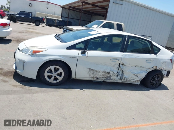 2015 Toyota Prius Four with VIN JTDKN3DU9F0475163, listed as a IAAI auction lot 42630828 with 158,095 mi miles and . Bid and sale history available at DreamBid. Image 14.