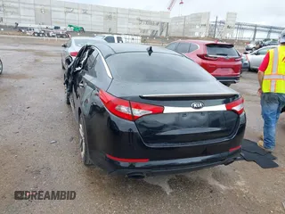 2013 Kia Optima SX with VIN 5XXGR4A64DG207512, listed as a IAAI auction lot 42483528 with 127,748 mi miles and . Bid and sale history available at DreamBid. Image 3.