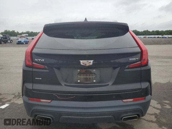 2021 Cadillac XT4 AWD Luxury with VIN 1GYFZBR4XMF014647, listed as a Copart auction lot 63800444 with 49,724 mi miles and Salvage Title. Bid and sale history available at carsss.com. Image 6.