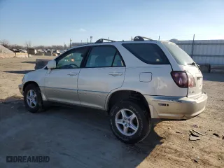 1999 Lexus RX 300 Luxury SUV with VIN JT6HF10U2X0053021, listed as a Copart auction lot 87867285 with 142,247 mi miles and Salvage Title. Bid and sale history available at carsss.com. Image 2.