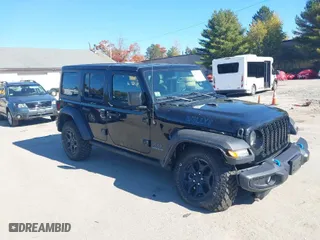 2023 Jeep Wrangler 4xe with VIN 1C4JJXN69PW604841, listed as a IAAI auction lot 40614070 with 21,737 mi miles. Bid and sale history available at carsss.com. Image 1.