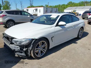 2014 BMW 4 Series 435i z VIN WBA3R1C51EK192103, wystawiony jako IAAI lot #42127351 z przebiegiem 99 023 mil mil oraz . Historia ofert i sprzedaży dostępna na DreamBid. Obrazek 2.