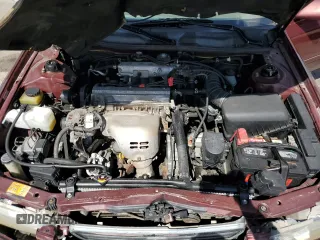 2000 Toyota Camry CE z VIN JT2BG22K4Y0449443, wystawiony jako Copart lot #58268475 z przebiegiem 292 853 mil mil oraz Szkoda całkowita • Salvage title. Historia ofert i sprzedaży dostępna na DreamBid. Obrazek 11.