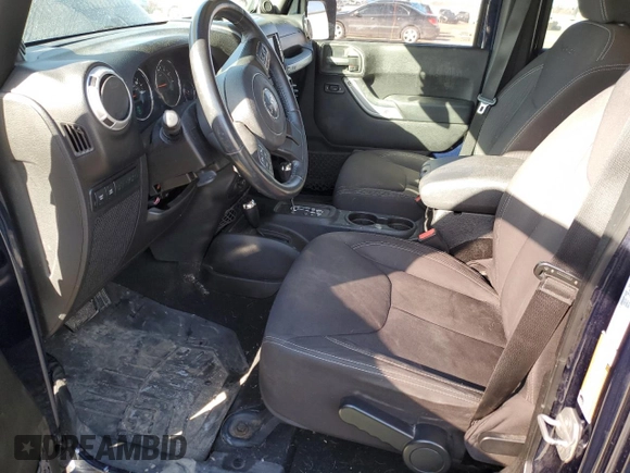 2013 Jeep Wrangler Unlimited Rubicon with VIN 1C4BJWFG5DL594280, listed as a Copart auction lot 46021265 with 117,102 mi miles and Salvage Title. Bid and sale history available at carsss.com. Image 7.