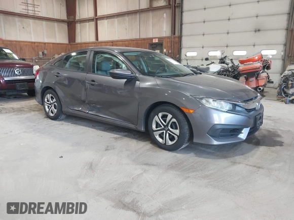 2016 Honda Civic Sedan LX with VIN 19XFC2F58GE214672, listed as a IAAI auction lot 42067792 with 73,929 mi miles. Bid and sale history available at carsss.com. Image 1.