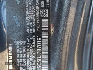2018 BMW M2 z VIN WBS1J5C50J7B70191, wystawiony jako Copart lot #86976284 z przebiegiem Nie podano mil oraz Szkoda całkowita • Salvage title. Historia ofert i sprzedaży dostępna na DreamBid. Obrazek 14.
