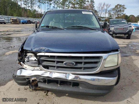 2003 Ford F-150 XL with VIN 1FTRX07273KB66549, listed as a Copart auction lot 83552004 with 205,026 mi miles and Salvage Title. Bid and sale history available at carsss.com. Image 5.