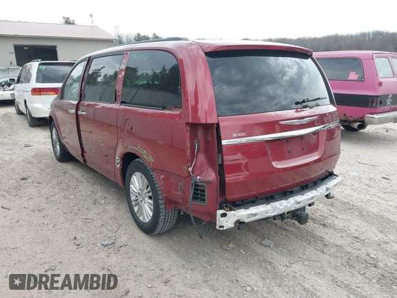 2014 Chrysler Town & Country Touring L with VIN 2C4RC1CGXER307492, listed as a IAAI auction lot 42021290 with 98,845 mi miles and . Bid and sale history available at carsss.com. Image 3.