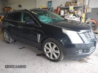 2014 Cadillac SRX Premium Collection z VIN 3GYFNGE30ES519292, wystawiony jako IAAI lot #42234268 z przebiegiem 122 017 mil mil oraz . Historia ofert i sprzedaży dostępna na DreamBid. Obrazek 1.