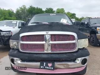 2004 Dodge Ram 2500 SLT with VIN 3D7KU28D04G103040, listed as a IAAI auction lot 42048102 with 253,181 mi miles. Bid and sale history available at carsss.com. Image 12.