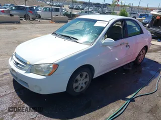 2005 Kia Spectra LX z VIN KNAFE122955121133, wystawiony jako IAAI lot #42434111 z przebiegiem 184 114 mil mil oraz . Historia ofert i sprzedaży dostępna na DreamBid. Obrazek 2.