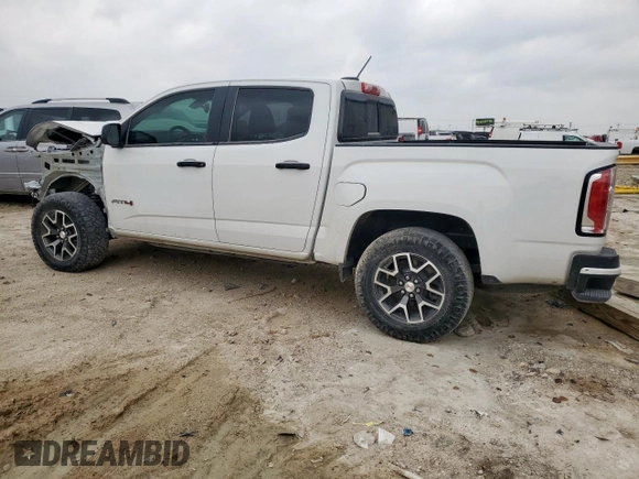 2021 GMC Canyon 4WD AT4 w/Leather with VIN 1GTG6FEN0M1122894, listed as a Copart auction lot 85734544 with 108,366 mi miles and Salvage Title. Bid and sale history available at carsss.com. Image 2.