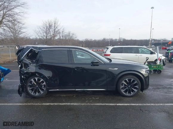2024 Mazda CX-90 PHEV Premium Plus with VIN JM3KKEHA3R1152141, listed as a IAAI auction lot 41490235 with NaN miles. Bid and sale history available at carsss.com. Image 13.