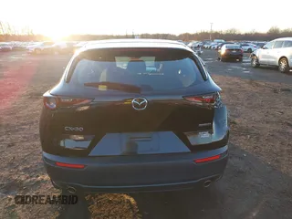 2021 Mazda CX-30 S with VIN 3MVDMAALXMM213642, listed as a IAAI auction lot 41010906 with 105,280 mi miles and . Bid and sale history available at DreamBid. Image 16.