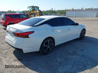 2023 Nissan Altima SR z VIN 1N4BL4CV6PN423635, wystawiony jako IAAI lot #42280027 z przebiegiem 21 193 mil mil oraz . Historia ofert i sprzedaży dostępna na DreamBid. Obrazek 4.