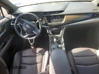 2021 Cadillac XT6 Premium Luxury with VIN 1GYKPCRS4MZ199110, listed as a Copart auction lot 51798905 with 66,486 mi miles and Salvage Title. Bid and sale history available at DreamBid. Image 8.
