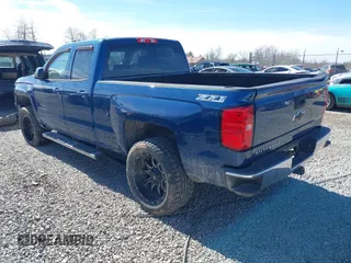 2015 Chevrolet Silverado 1500 LT with VIN 1GCVKREC5FZ325903, listed as a IAAI auction lot 41821848 with 116,461 mi miles. Bid and sale history available at carsss.com. Image 3.
