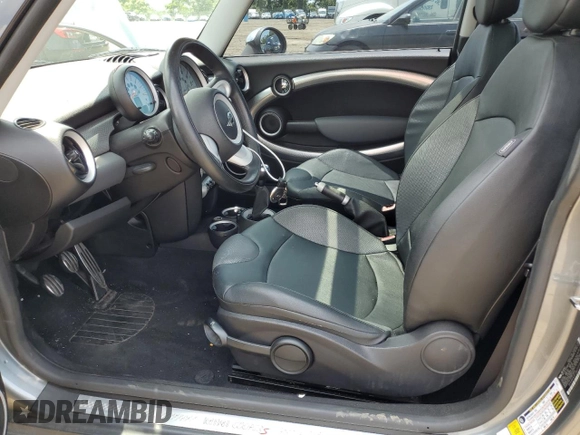 2007 MINI Hardtop S with VIN WMWMF73577TT84087, listed as a Copart auction lot 60208895 with 76,248 mi miles and Salvage title. Bid and sale history available at DreamBid. Image 7.