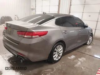 2017 Kia Optima EX with VIN 5XXGU4L36HG143321, listed as a IAAI auction lot 41589617 with 116,972 mi miles. Bid and sale history available at carsss.com. Image 4.