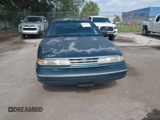 1995 Ford Crown Victoria LX с VIN 2FALP74W9SX120258, выставлен на аукционе IAAI как лот 42414057 с пробегом 210 215 миль миль и . История ставок и продаж доступна на DreamBid. Изображение 6.