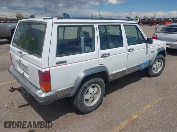 1992 Jeep Cherokee with VIN 1J4FJ58S0NL102716, listed as a IAAI auction lot 42169406 with 197,167 mi miles and . Bid and sale history available at DreamBid. Image 4.