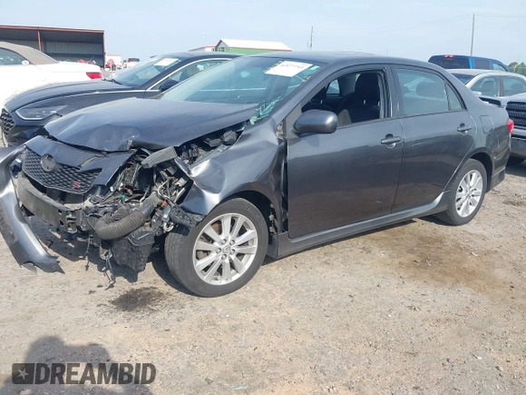 2010 Toyota Corolla with VIN 2T1BU4EE7AC447067, listed as a IAAI auction lot 42077793 with 158,093 mi miles. Bid and sale history available at carsss.com. Image 2.