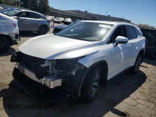 2022 Lexus RX with VIN JTJHGKFA5N2022904, listed as a Copart auction lot 67778374 with 25,512 mi miles and Salvage Title. Bid and sale history available at carsss.com. Image 1.
