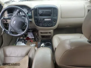 2002 Ford Escape Limited with VIN 1FMCU04152KA61660, listed as a Copart auction lot 64577534 with 165,448 mi miles and Clean Title. Bid and sale history available at carsss.com. Image 8.