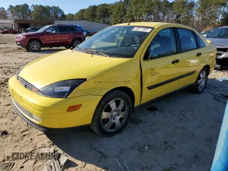 2001 Ford Focus with VIN 1FAHP343X1W229536, listed as a Copart auction lot 83611964 with 86,787 mi miles and Salvage title. Bid and sale history available at DreamBid. Image 1.