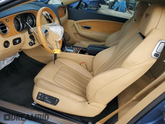 2013 Bentley Continental GT with VIN SCBGR3ZA0DC079677, listed as a Copart auction lot 82753764 with 58,406 mi miles and Salvage Title. Bid and sale history available at DreamBid. Image 7.