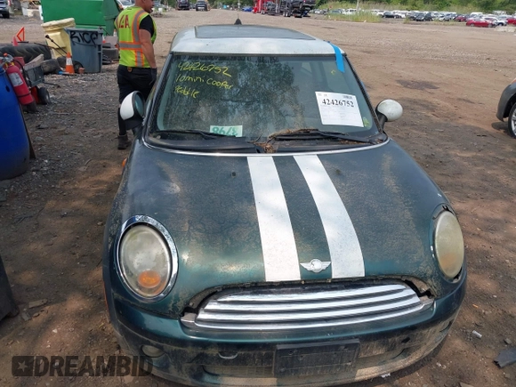 2010 MINI Hardtop with VIN WMWMF3C57ATZ24618, listed as a IAAI auction lot 42426752 with 68,973 mi miles and . Bid and sale history available at DreamBid. Image 6.