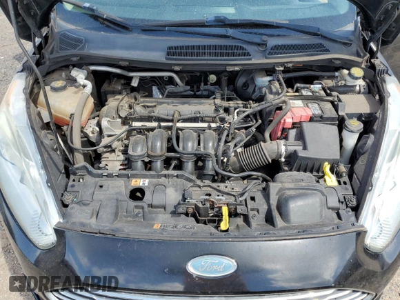 2014 Ford Fiesta Titanium z VIN 3FADP4FJXEM228098, wystawiony jako Copart lot #55173975 z przebiegiem 109 311 mil mil oraz Szkoda całkowita • Salvage title. Historia ofert i sprzedaży dostępna na DreamBid. Obrazek 12.