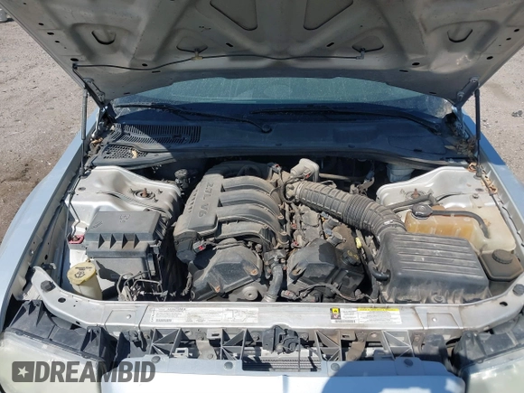 2007 Chrysler 300 with VIN 2C3KA43R67H664434, listed as a IAAI auction lot 41884172 with 238,451 mi miles. Bid and sale history available at carsss.com. Image 10.