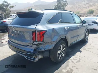 2021 Kia Sorento S with VIN 5XYRL4LCXMG073937, listed as a IAAI auction lot 42595810 with 71,507 mi miles and . Bid and sale history available at DreamBid. Image 4.