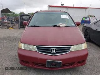 2002 Honda Odyssey EX-L z VIN 2HKRL18092H572036, wystawiony jako IAAI lot #42122713 z przebiegiem Nie podano mil oraz . Historia ofert i sprzedaży dostępna na DreamBid. Obrazek 6.