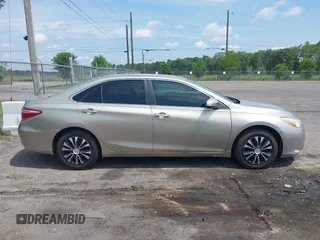 2016 Toyota Camry XLE with VIN 4T1BF1FKXGU259860, listed as a IAAI auction lot 42219507 with 239,145 mi miles and . Bid and sale history available at DreamBid. Image 13.