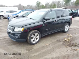 2013 Jeep Compass Latitude with VIN 1C4NJDEB2DD280393, listed as a IAAI auction lot 42028703 with 148,766 mi miles. Bid and sale history available at carsss.com. Image 2.