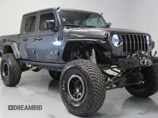 2023 Jeep Gladiator Freedom z VIN 1C6HJTAG2PL519578, wystawiony jako Copart lot #58429715 z przebiegiem 41 914 mil mil oraz Szkoda całkowita • Salvage title. Historia ofert i sprzedaży dostępna na DreamBid. Obrazek 1.