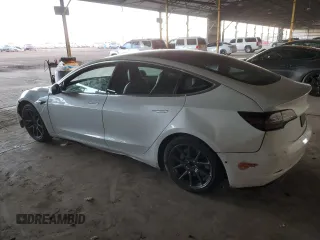 2019 Tesla Model 3 Mid Range with VIN 5YJ3E1EA3KF425125, listed as a Copart auction lot 82681864 with 105,345 mi miles and Salvage Title. Bid and sale history available at DreamBid. Image 2.
