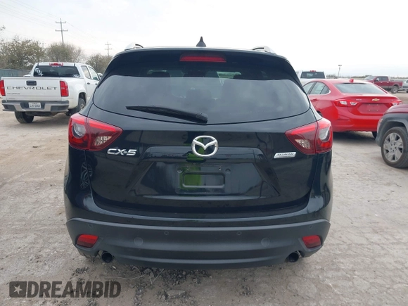 2016 Mazda CX-5 Grand Touring with VIN JM3KE2DY0G0651300, listed as a IAAI auction lot 41678833 with 98,790 mi miles. Bid and sale history available at carsss.com. Image 16.