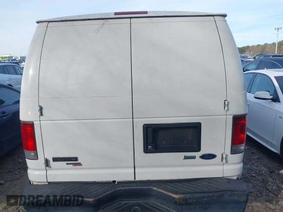 2011 Ford Econoline Cargo Commercial with VIN 1FTNE1EW3BDA96826, listed as a IAAI auction lot 41314002 with 408,264 mi miles and . Bid and sale history available at carsss.com. Image 16.