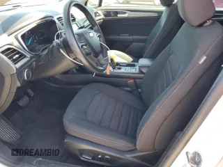 2020 Ford Fusion SE with VIN 3FA6P0LU0LR154013, listed as a Copart auction lot 54933055 with 122,197 mi miles and Salvage title. Bid and sale history available at DreamBid. Image 7.