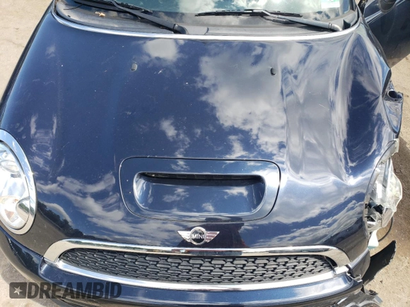 2012 MINI Convertible S z VIN WMWZP3C58CT550011, wystawiony jako Copart lot #57512034 z przebiegiem 71 366 mil mil oraz Szkoda całkowita • Salvage title. Historia ofert i sprzedaży dostępna na DreamBid. Obrazek 11.