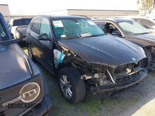 2015 BMW X5 sDrive35i with VIN 5UXKR2C54F0H35124, listed as a IAAI auction lot 41885474 with 88,865 mi miles. Bid and sale history available at carsss.com. Image 1.