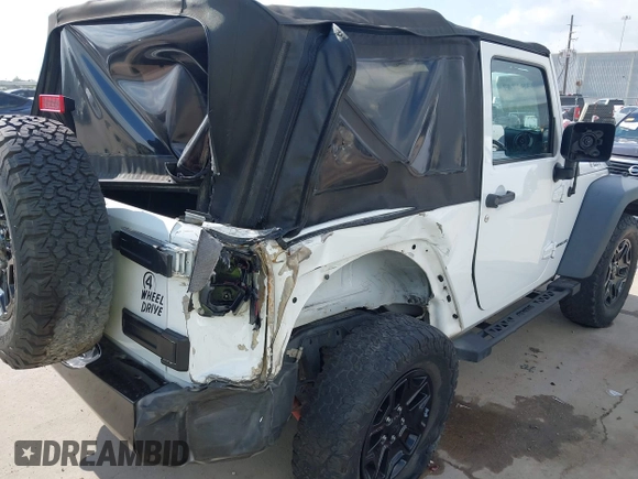 2015 Jeep Wrangler Willys Wheeler with VIN 1C4AJWAG0FL562536, listed as a IAAI auction lot 42384747 with 103,507 mi miles and . Bid and sale history available at DreamBid. Image 6.